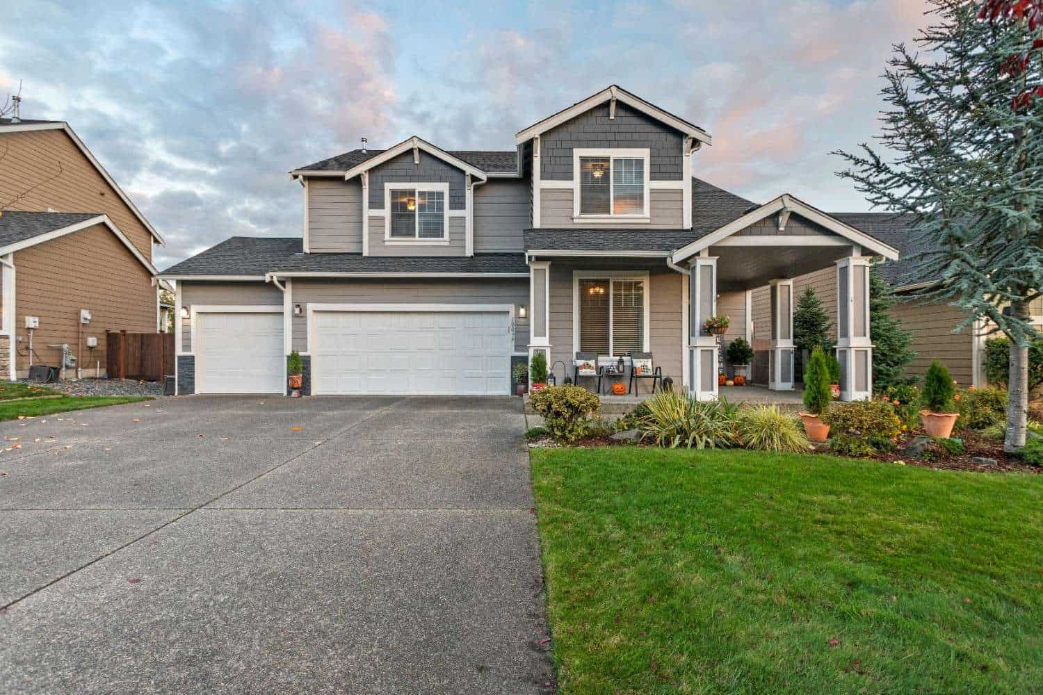 Well-maintained suburban home exterior in a landscaped neighborhood representing HOA management services in Sherwood, Oregon.